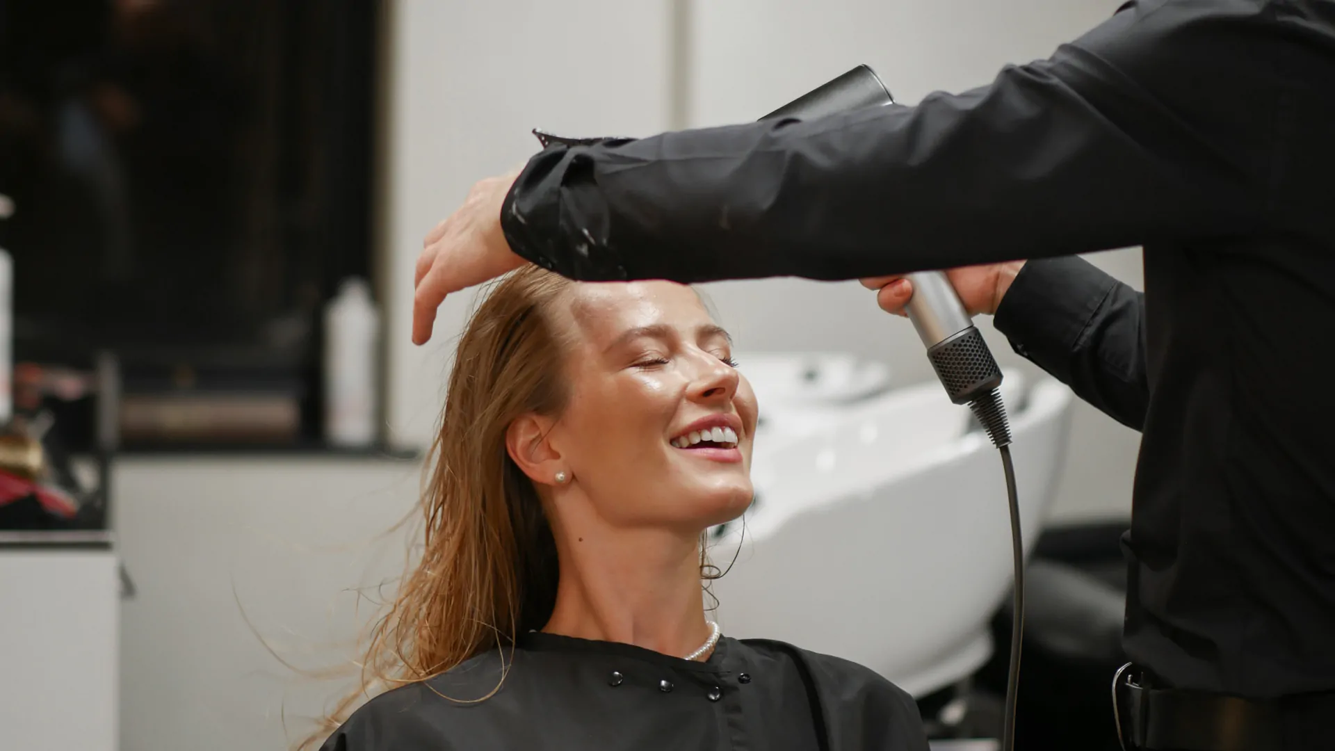 A finished hairstyle featuring hairstyling for ladies.