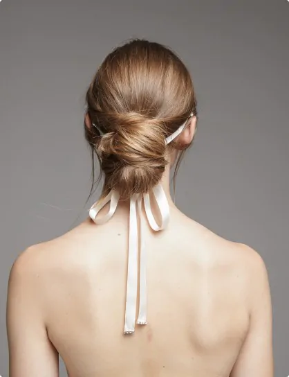A stylish look enhanced by hairstyling for ladies.