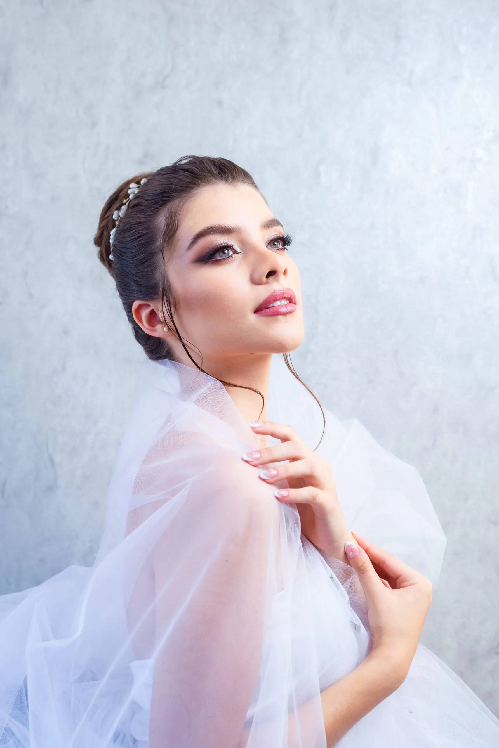 A polished hairstyle featuring wedding hairstyles.