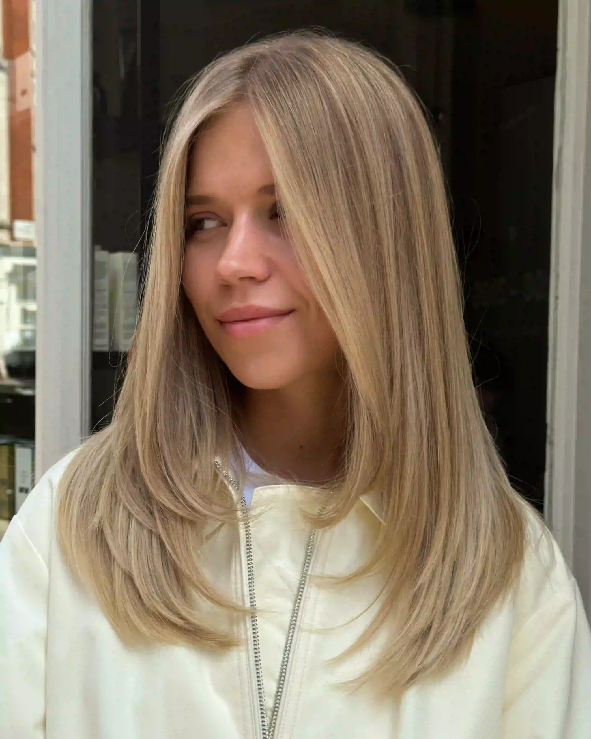 Women’s Haircuts with long layered blonde hair