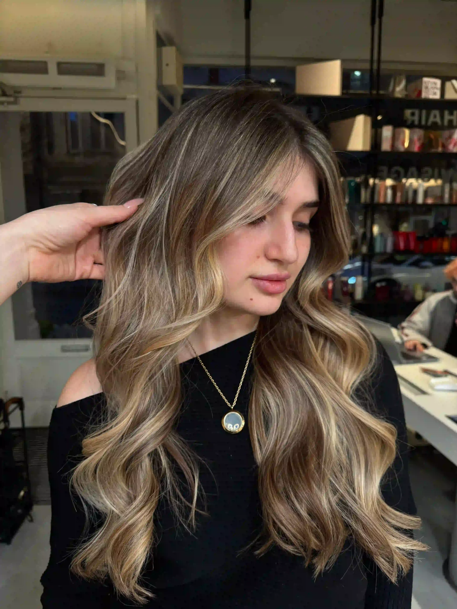 Airtouch hair highlights with soft blended blonde tones