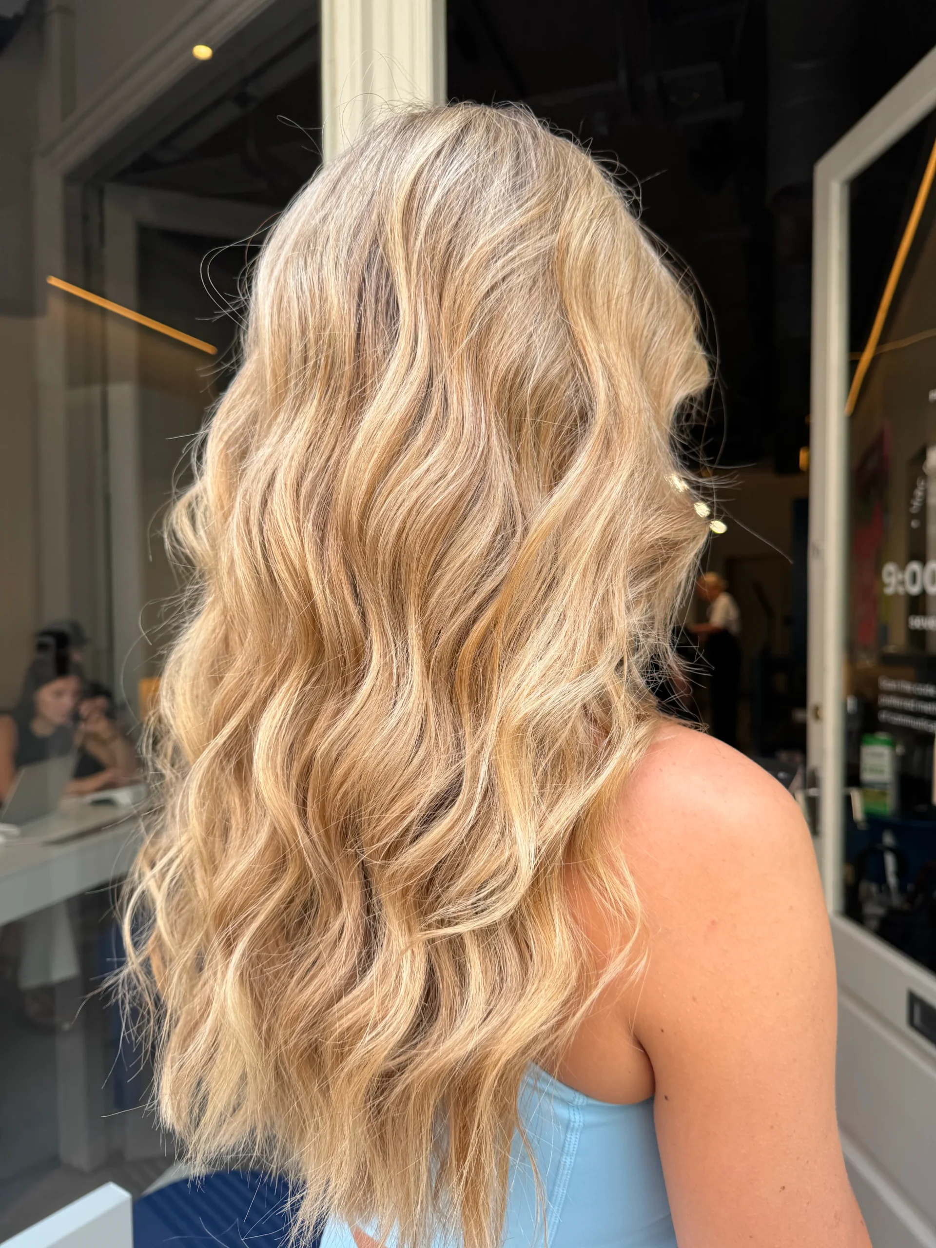 A finished hairstyle enhanced by a hair toner.