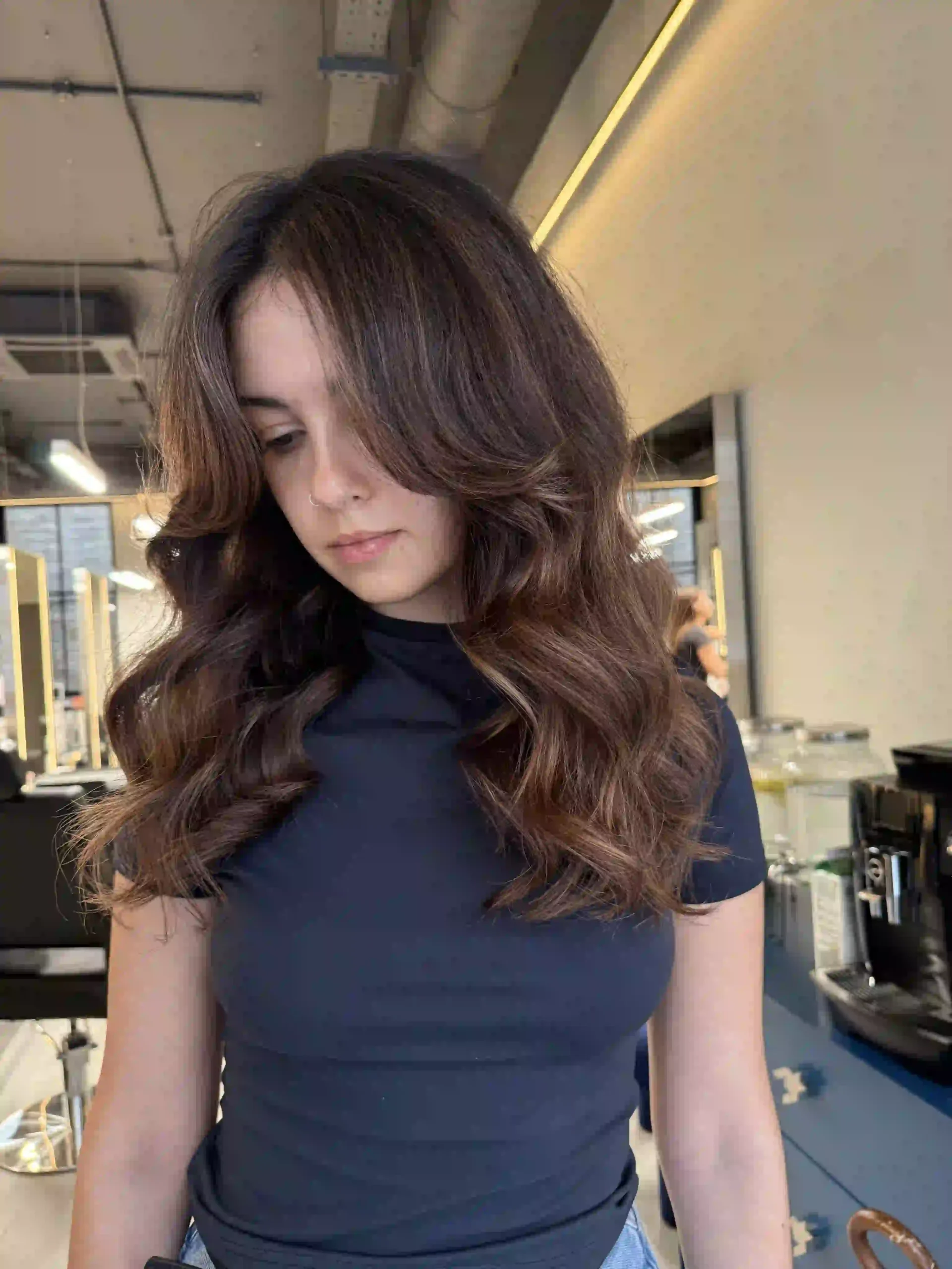 Shatush on long brown hair with soft waves