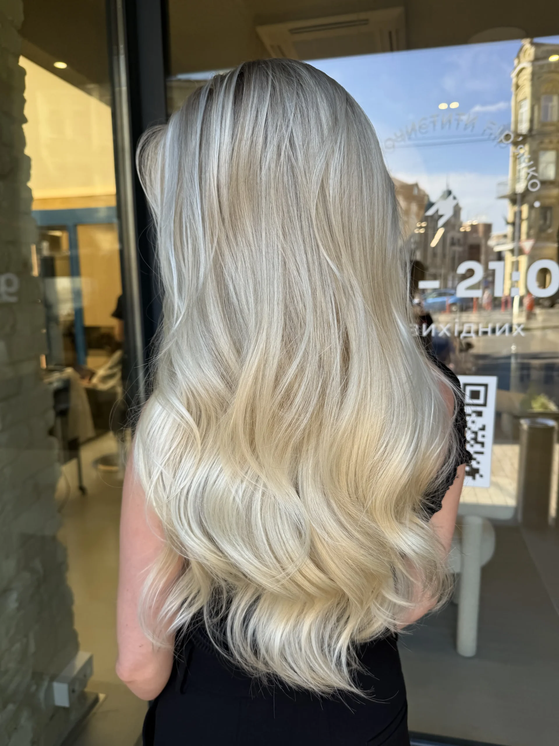 A refined appearance created through hair coloring services.