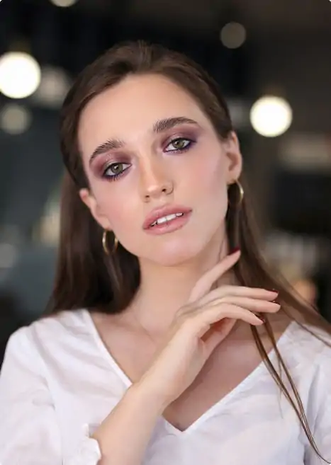 Classic evening glam featuring winged eyeliner and full coverage foundation