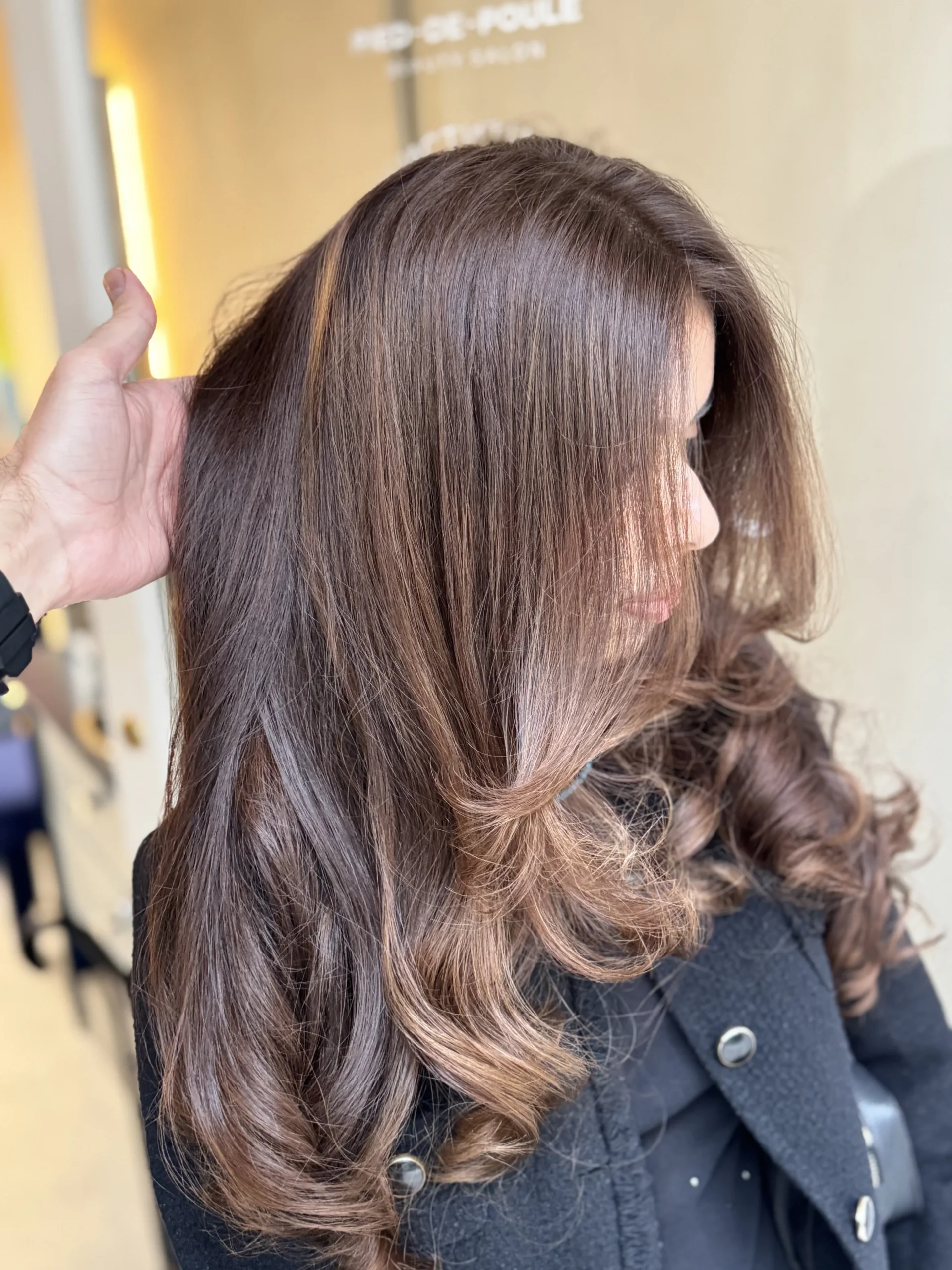Fresh new look with professional hair coloring services.