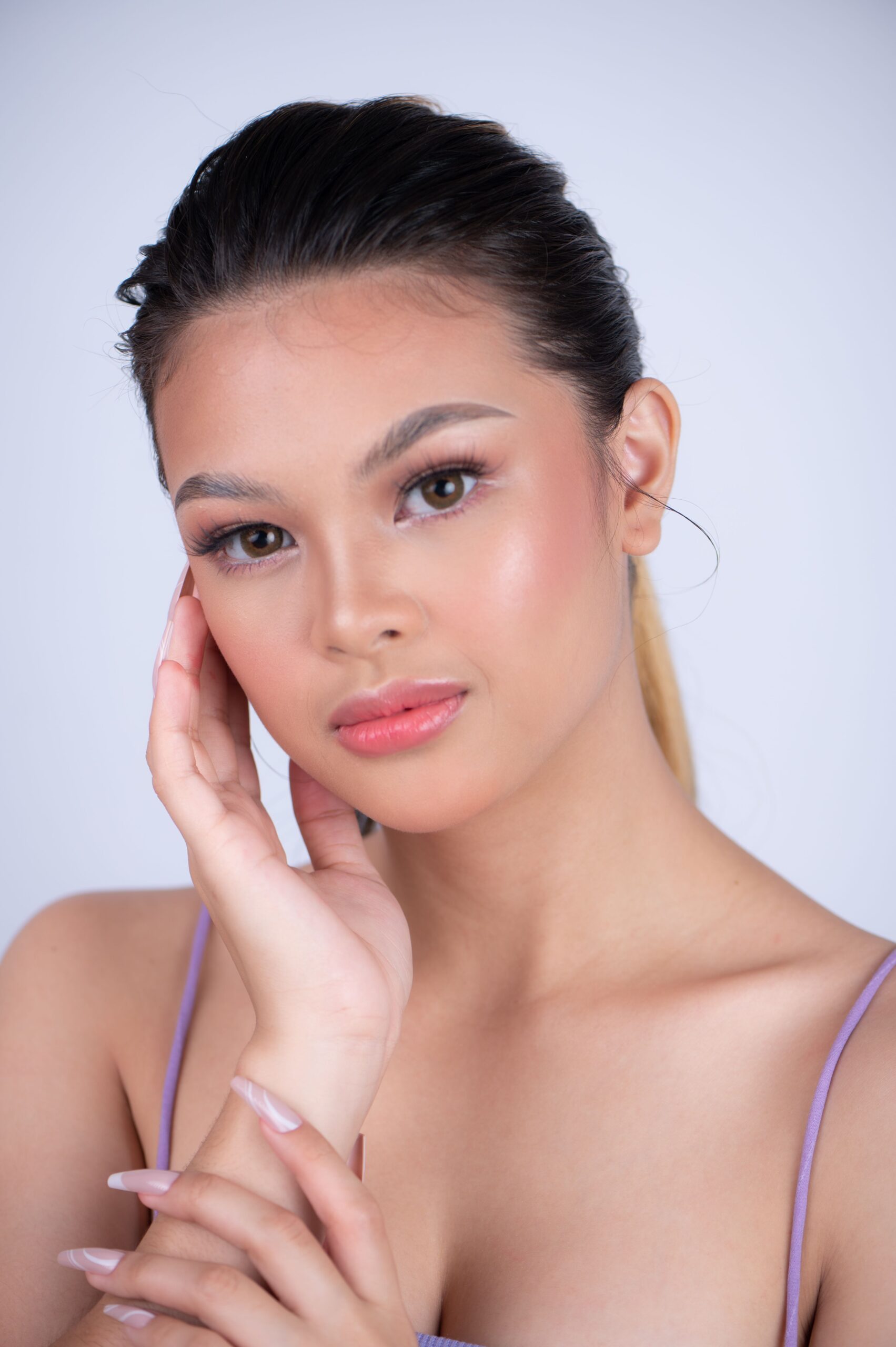 Subtle makeup style featuring a fresh, glowing complexion