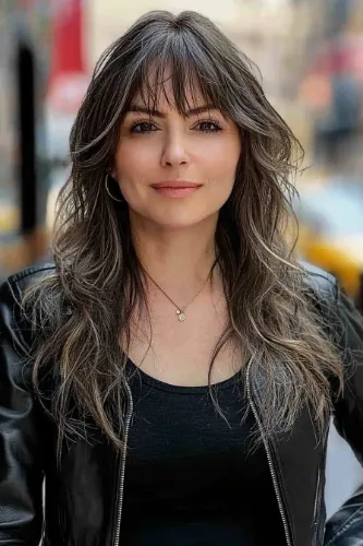 Wolf Cut with soft layers and a natural, modern look.