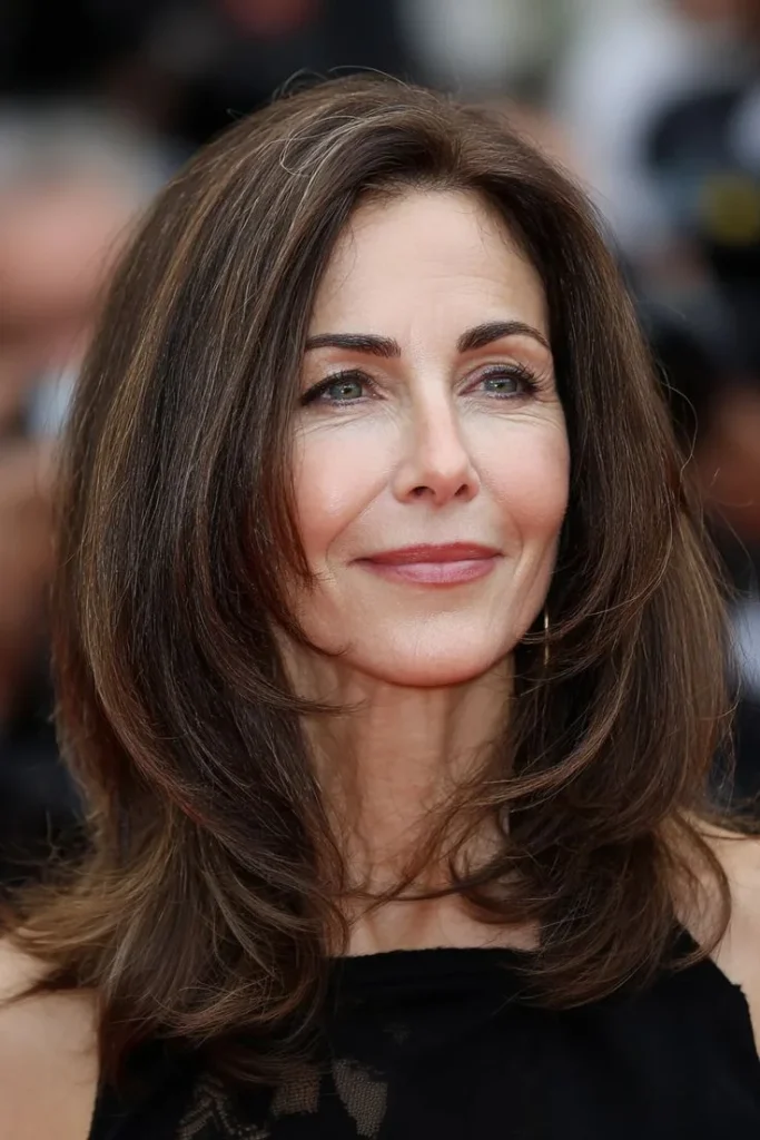 Shoulder-length hair with long layers for a soft, flowing look.