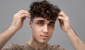 Young man with curly hair after Perms for Men